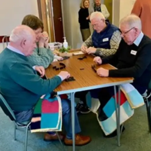 Group playing dominoes